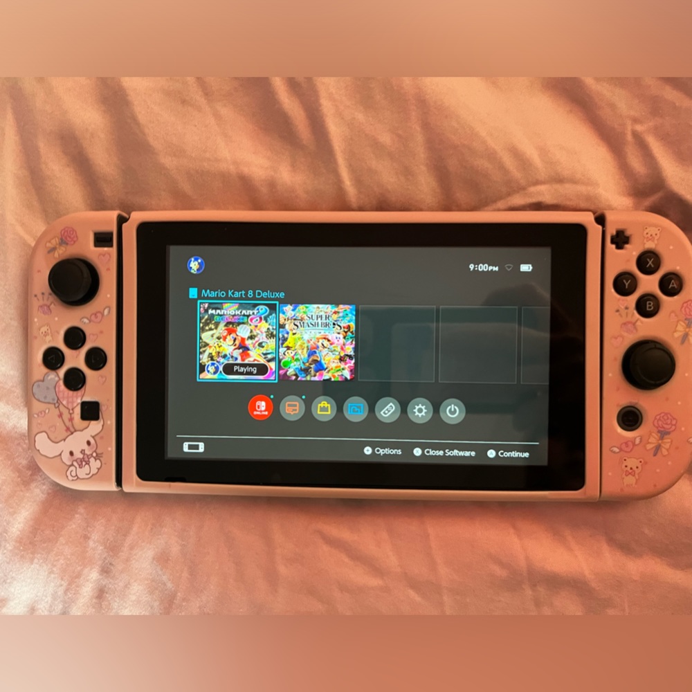 Nintendo Switch with case and games